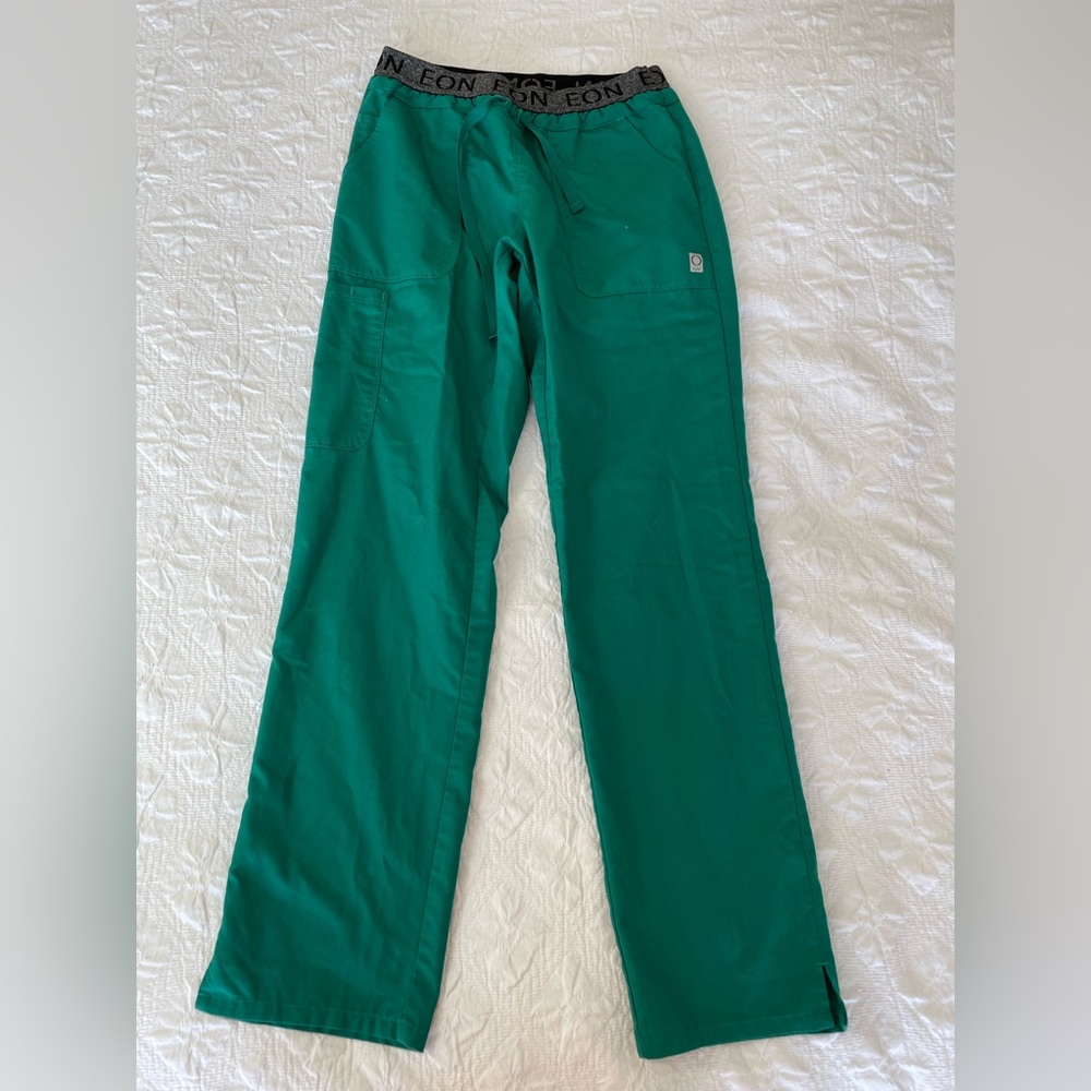 EON by Maevn green scrub pants.